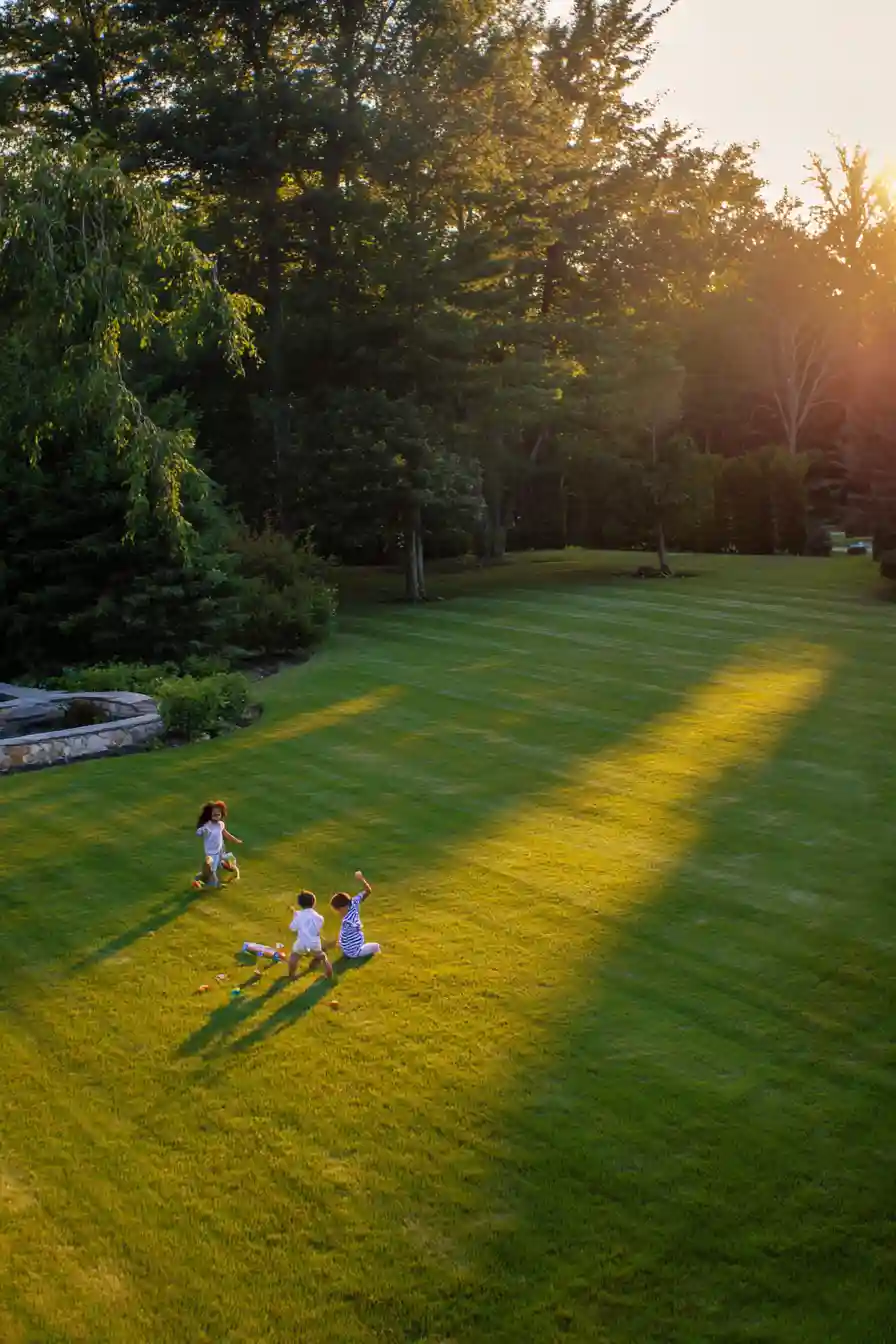 kids playing on trimmed lawn melbourne 896